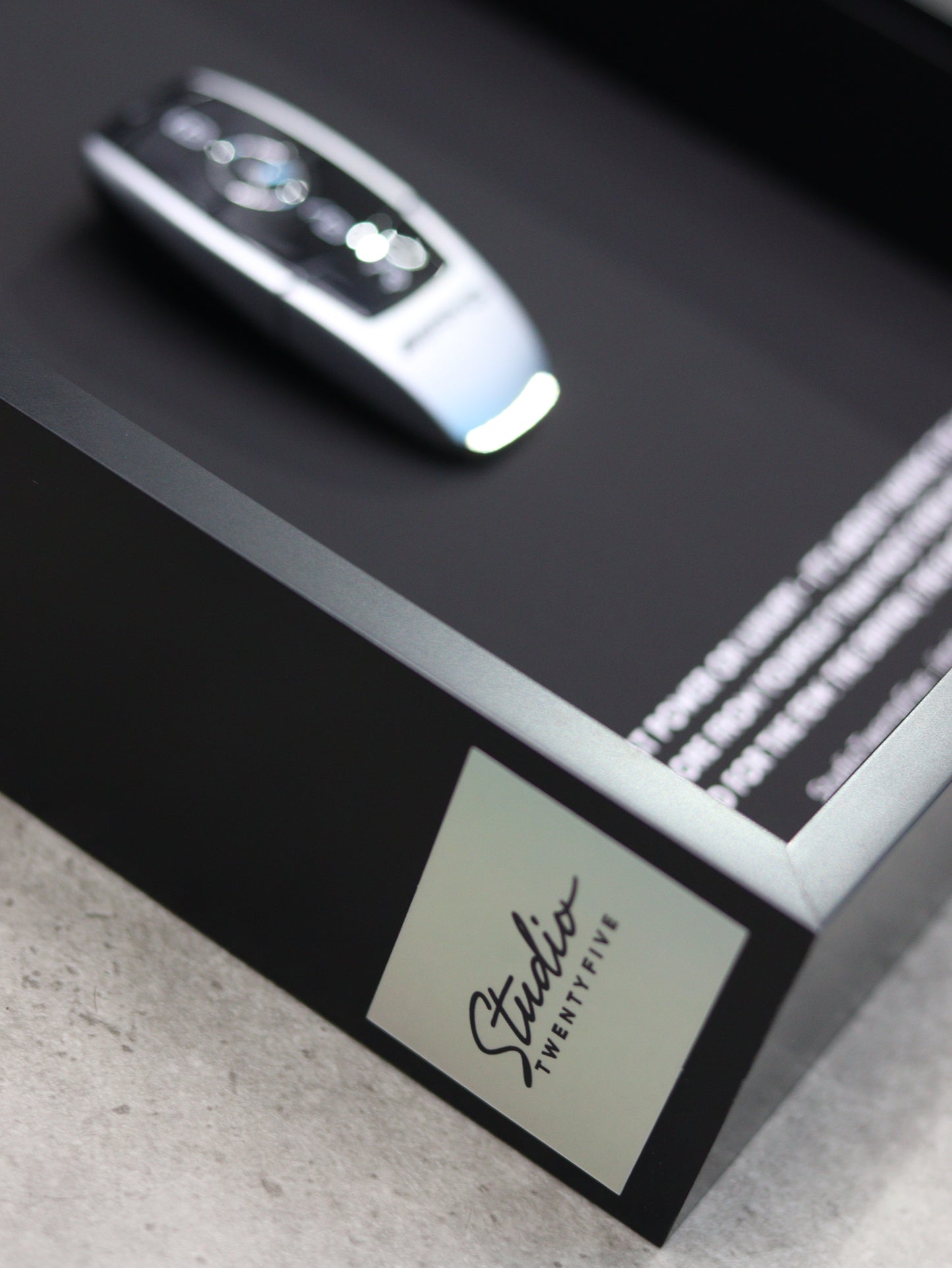 Side angle view of AMG key frame showing professional craftsmanship and depth
