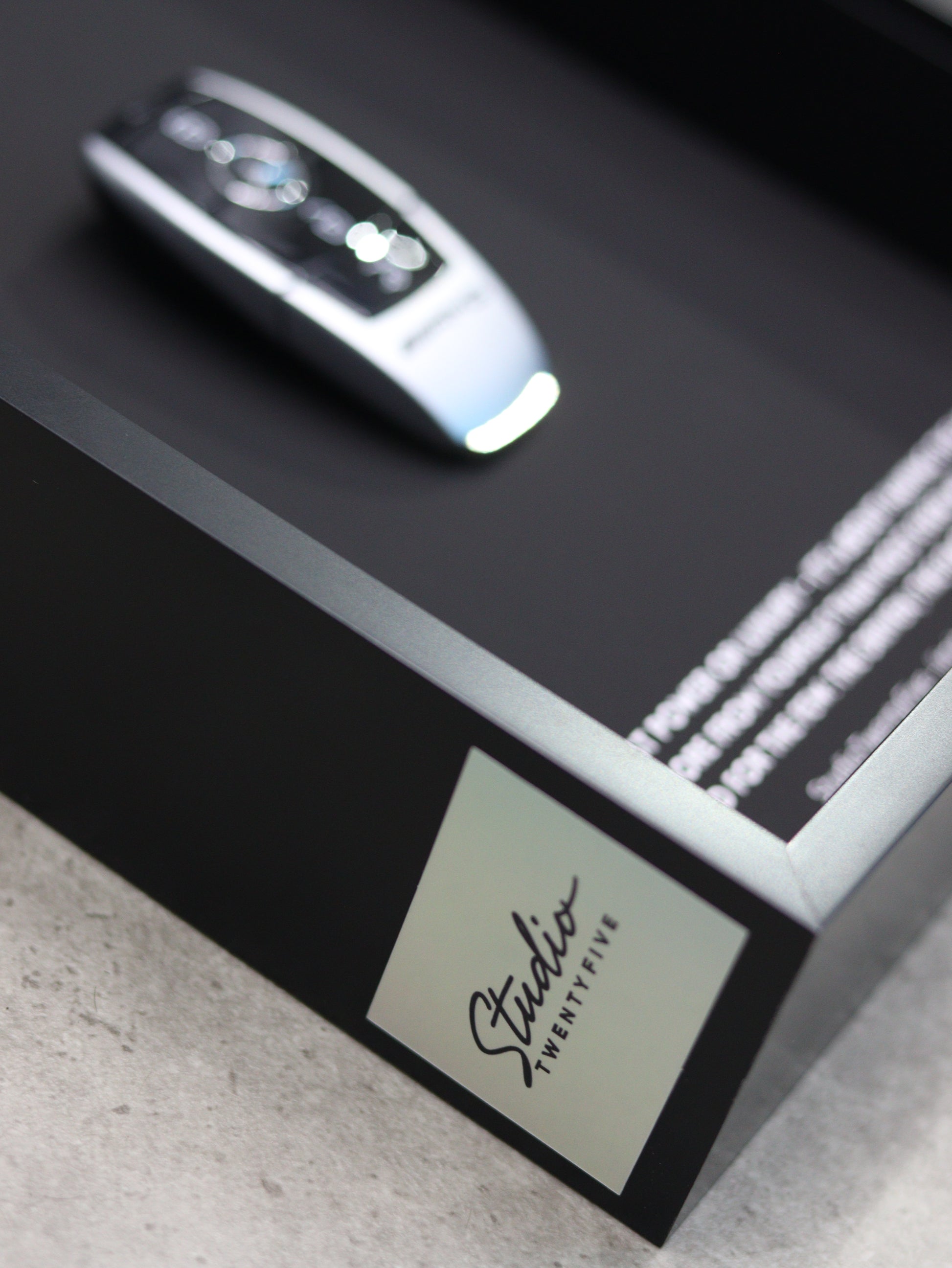 Side angle view of AMG key frame showing professional craftsmanship and depth
